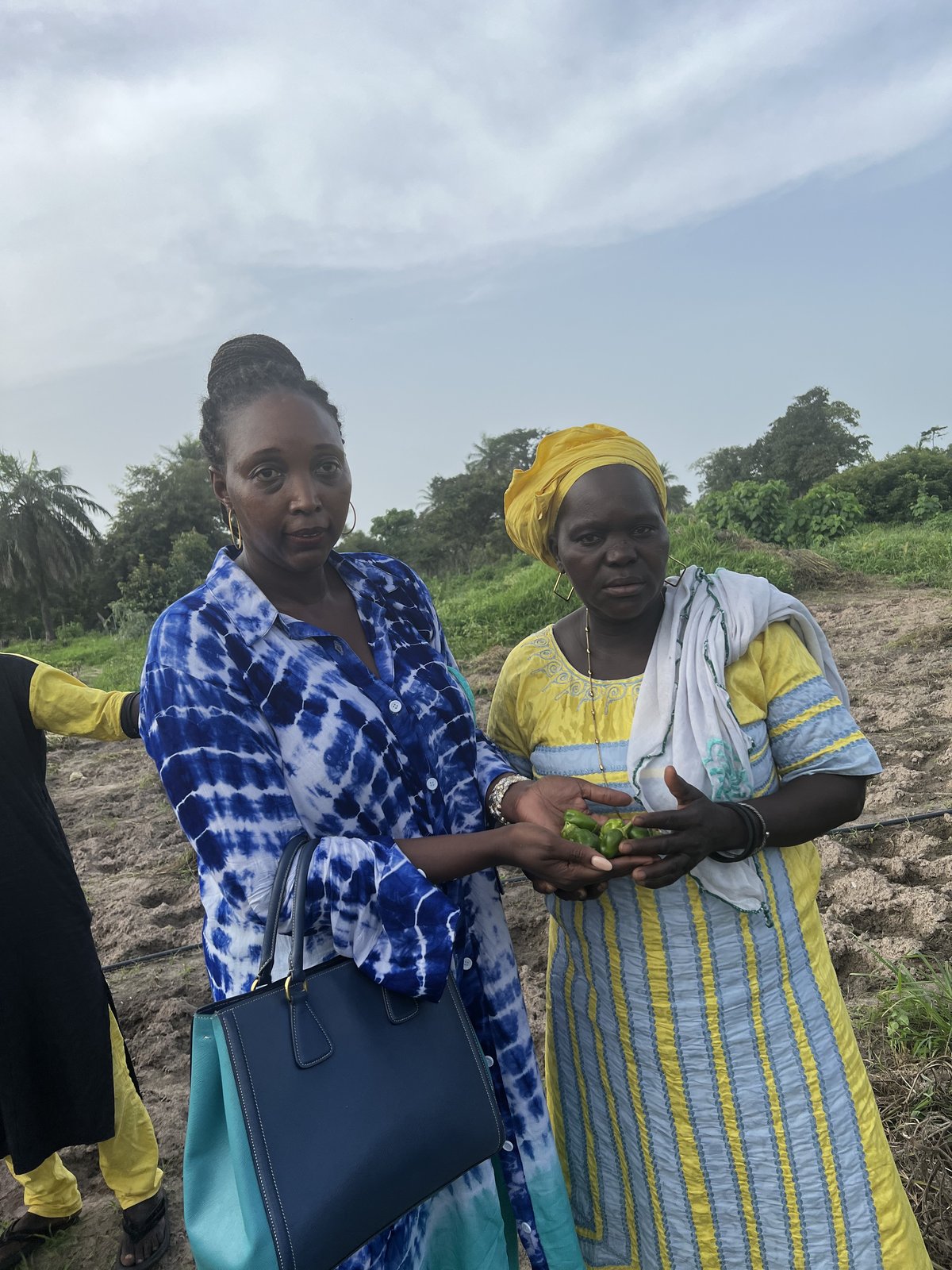 Aisha Jallow with a woman farmer